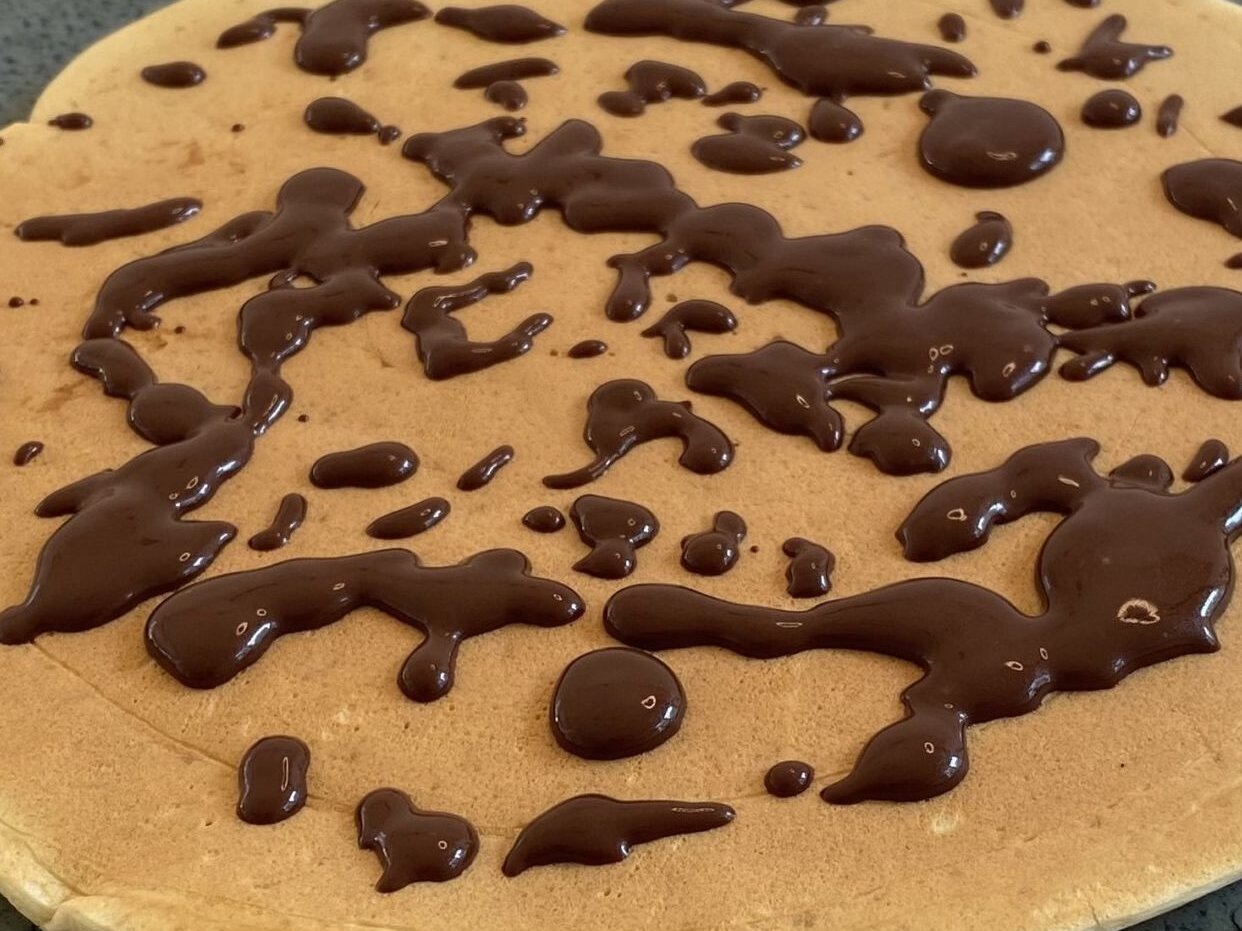 Healthy pancake with melted chocolate